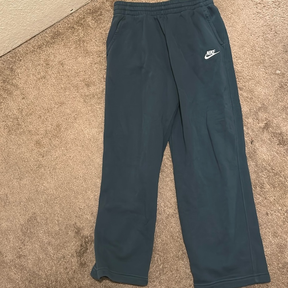 Dark blue/green Nike sweats open bottom